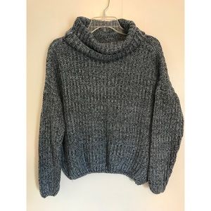 Grayish colored sweater